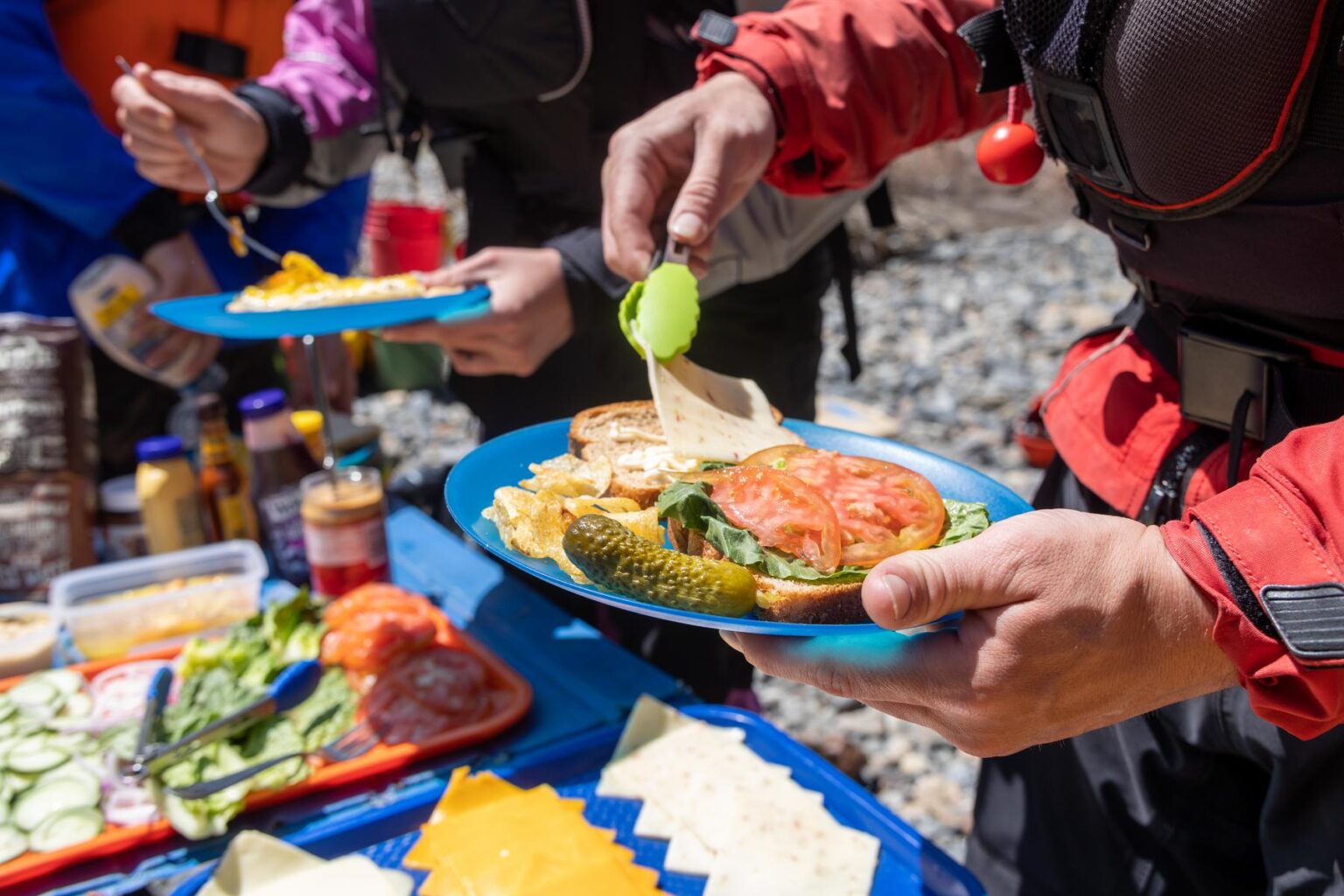 Enjoying lunch on an OARS Merced River rafting trip
