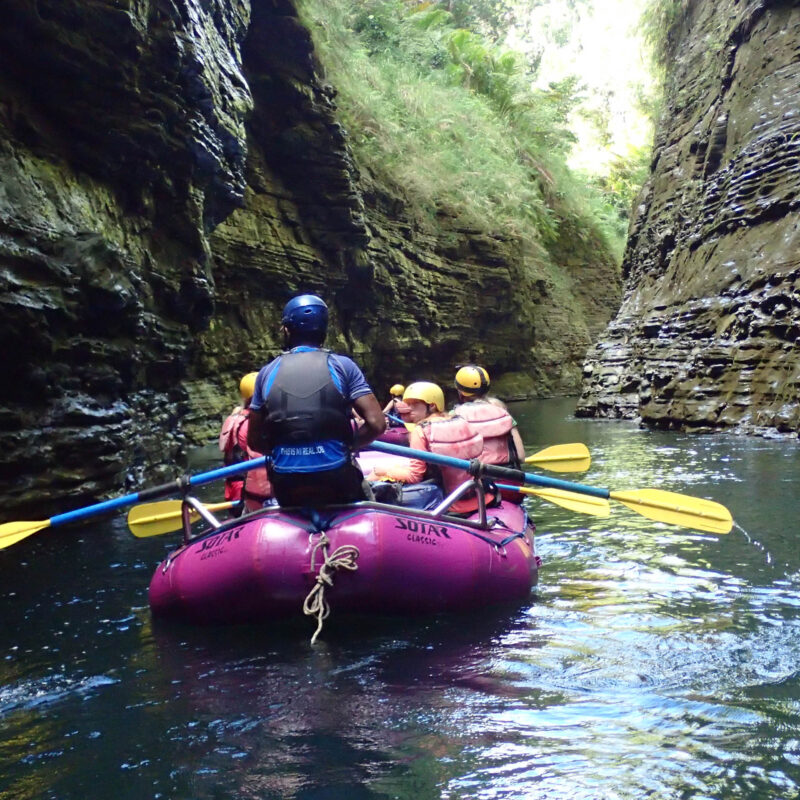 A group rafting down the Upper Navua Gorge.